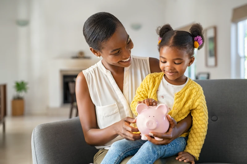 mom-and-daughter-saving-money